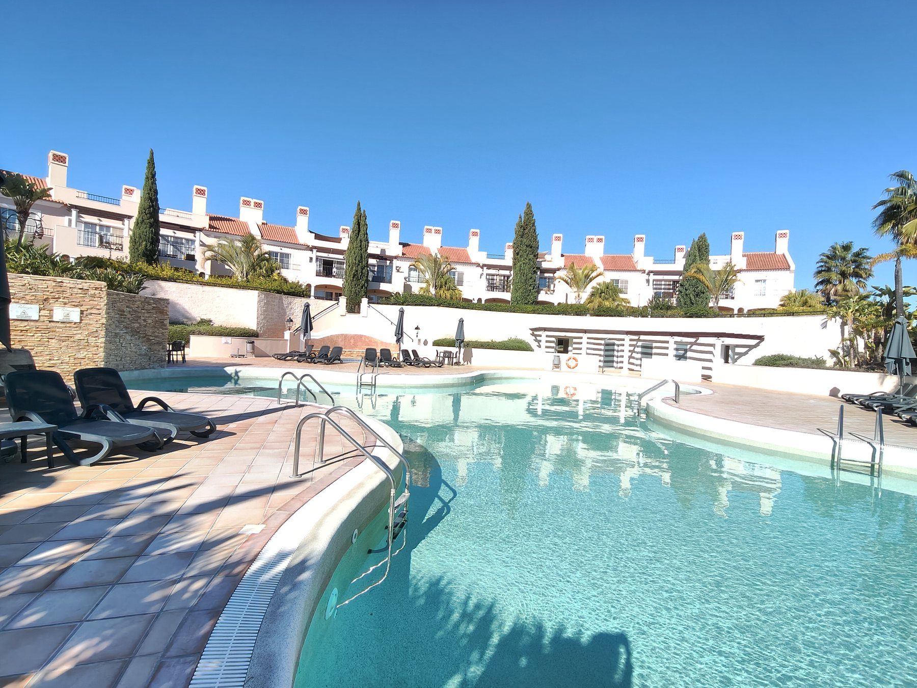 Palmyra, Vila Sol — landscaped communal pool