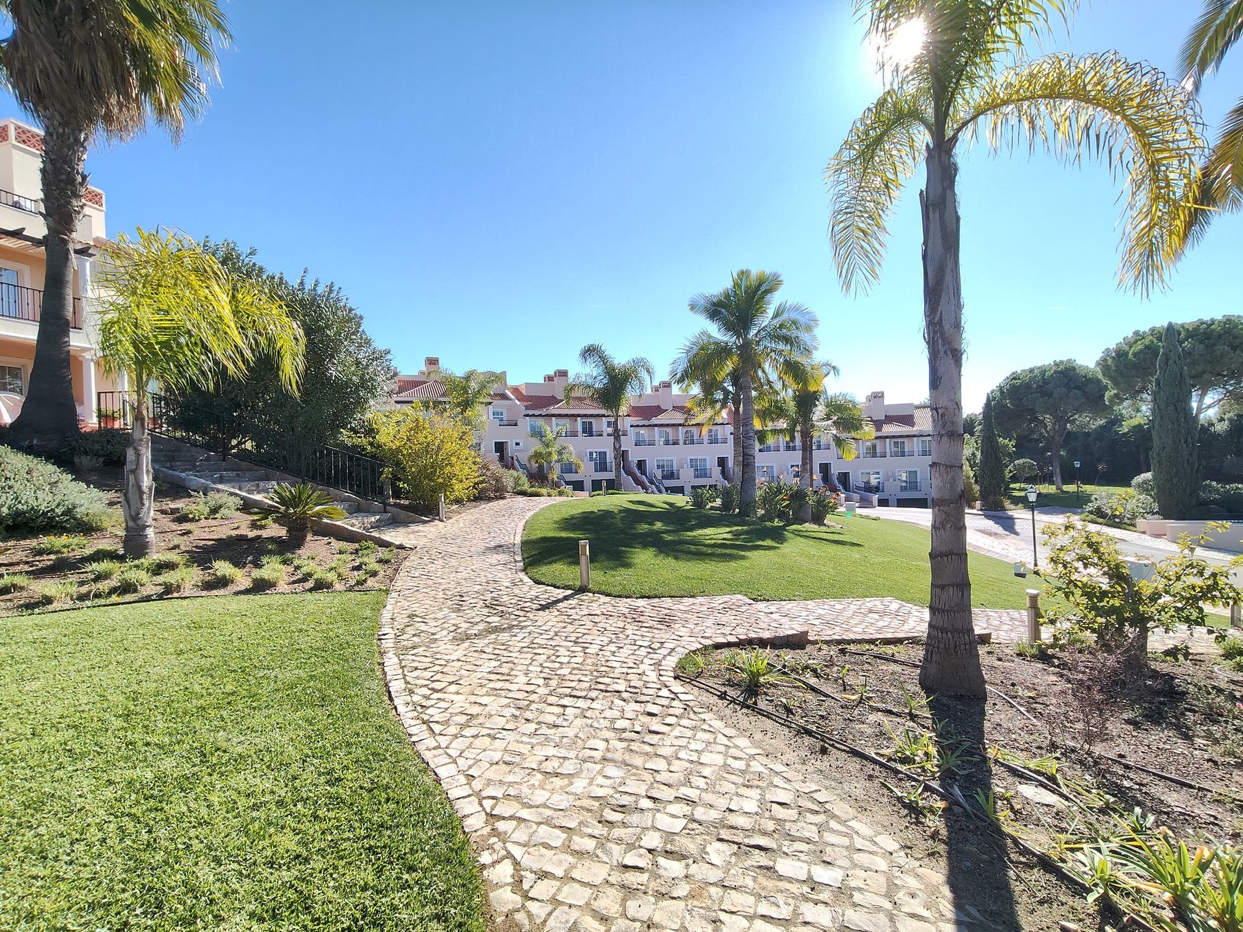 Palmyra, Vila Sol — garden path through the community