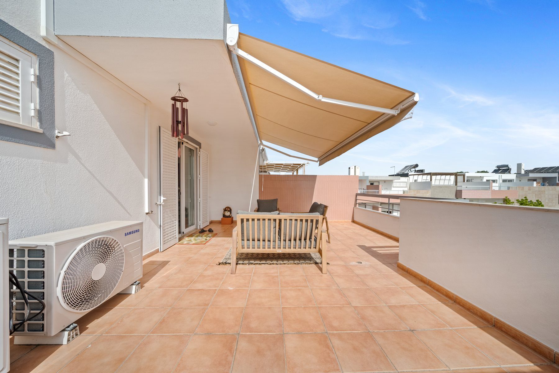 Tavira townhouse — rooftop terrace with wide views over the town