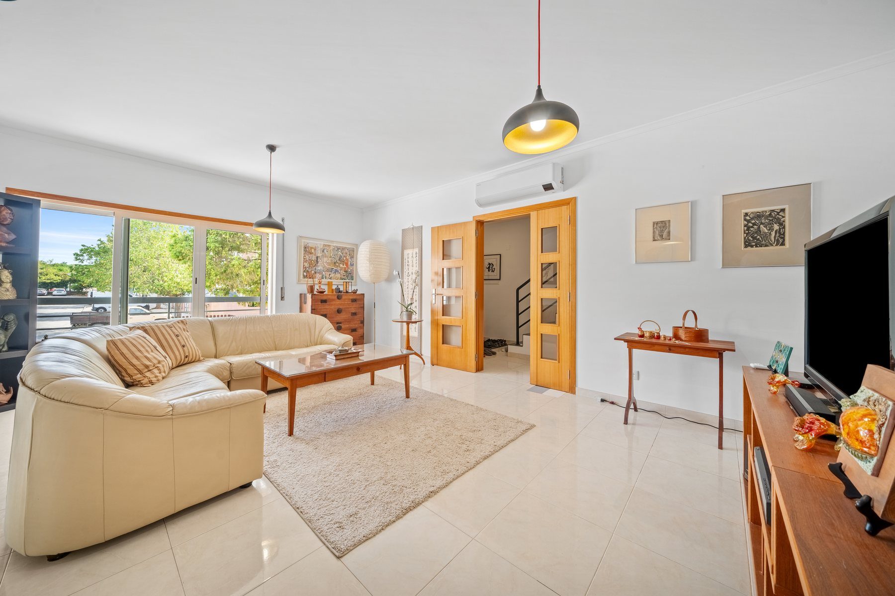 Tavira townhouse — living room with tiled floors