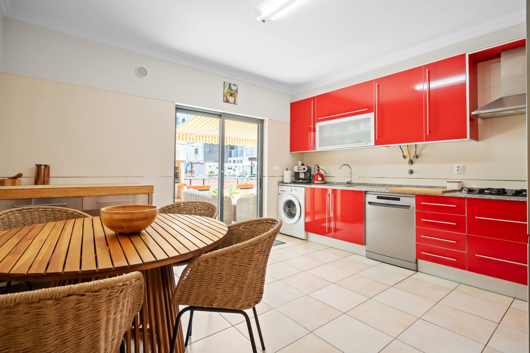 Colinas da Boavista, Tavira — fully equipped kitchen opening onto the terrace