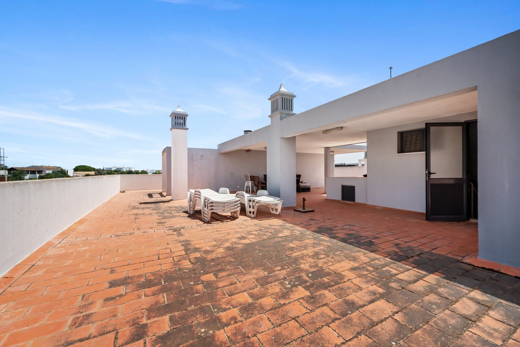 Colinas da Boavista, Tavira — the wide rooftop terrace looking out across the town