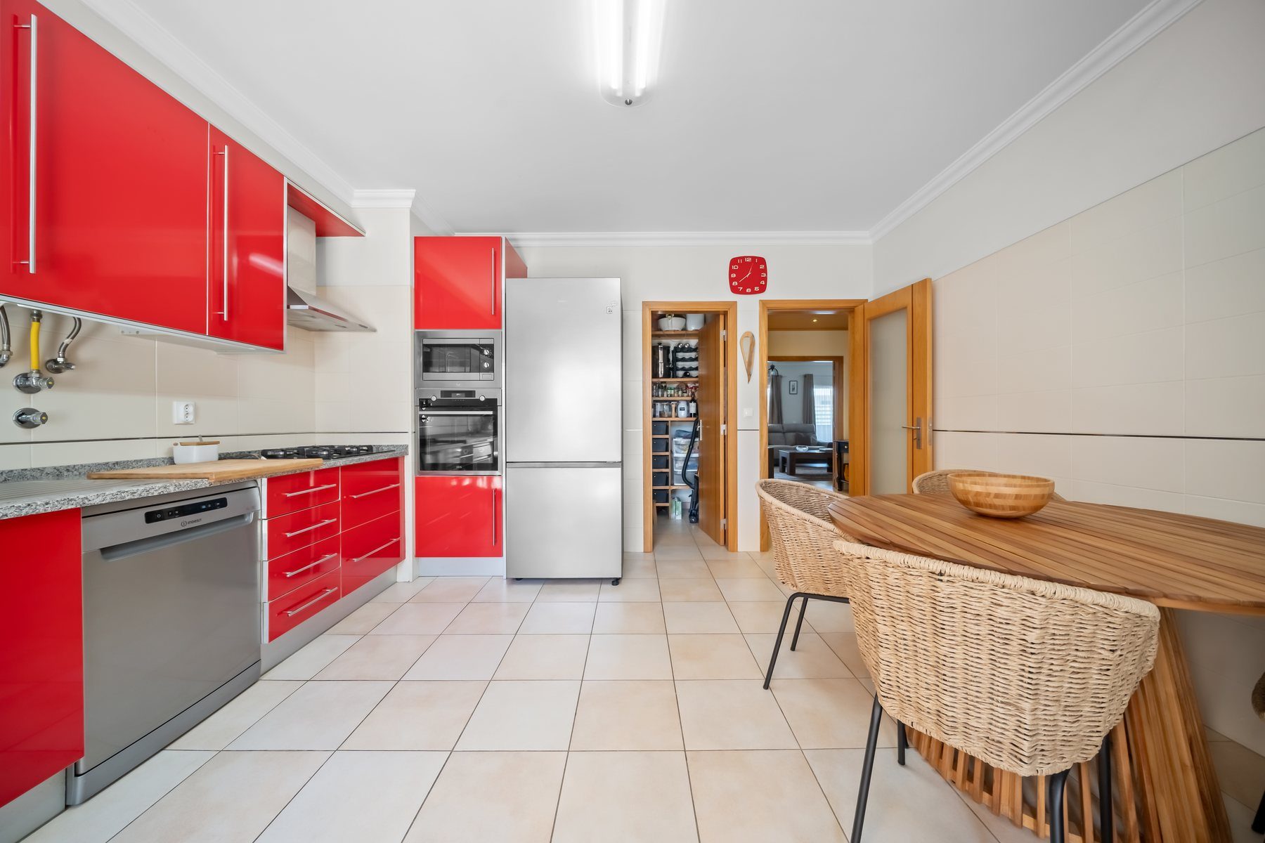 Colinas da Boavista, Tavira — kitchen with dining space and terrace access