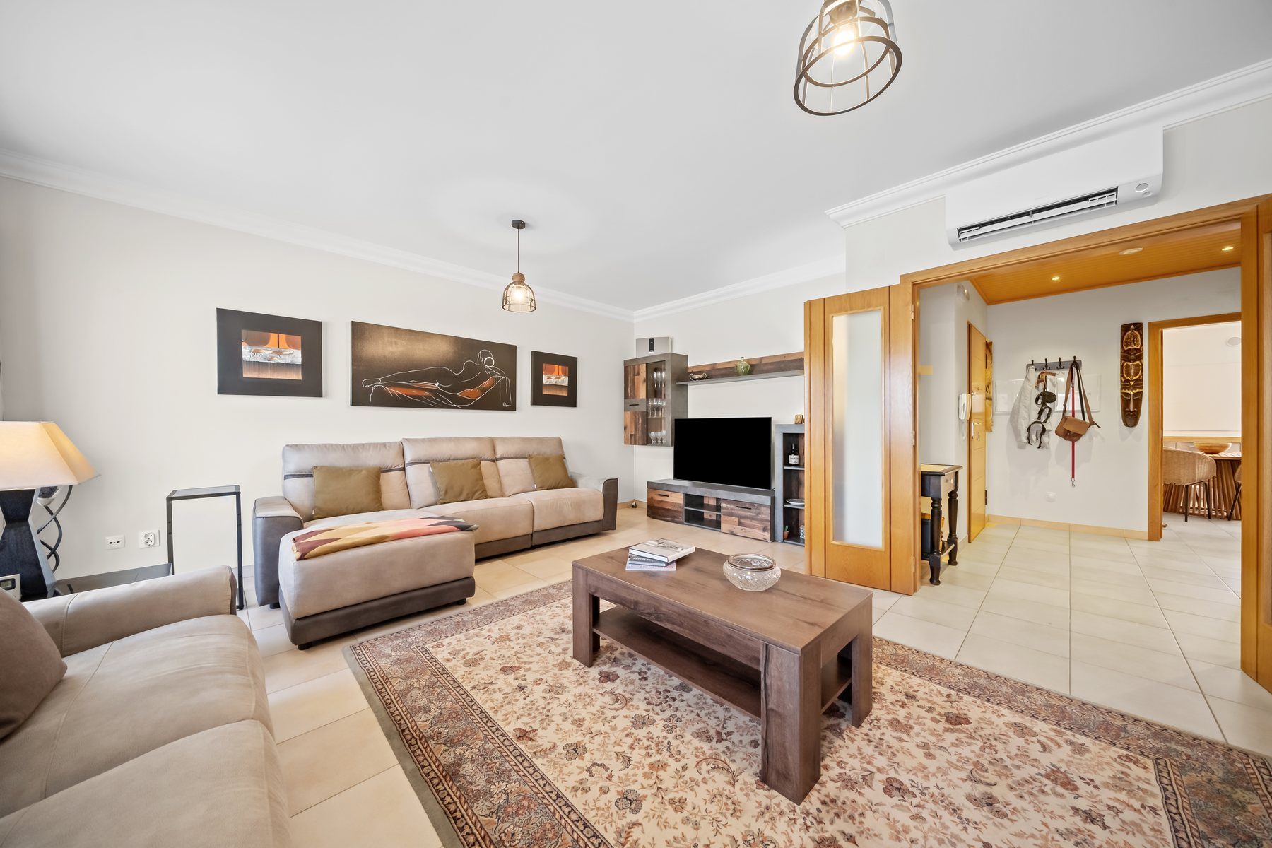 Colinas da Boavista, Tavira — living room opening through to the rest of the apartment